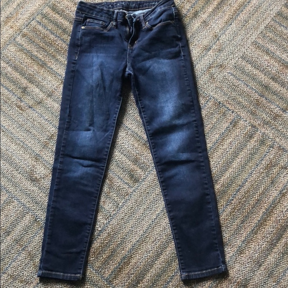 Calvin Klein dark washed jeans.